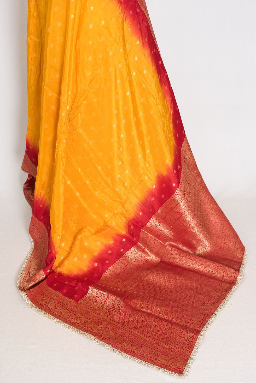 Thumbnail: Front full-length view of the yellow and red Dola silk Banarasi saree draped on a mannequin.