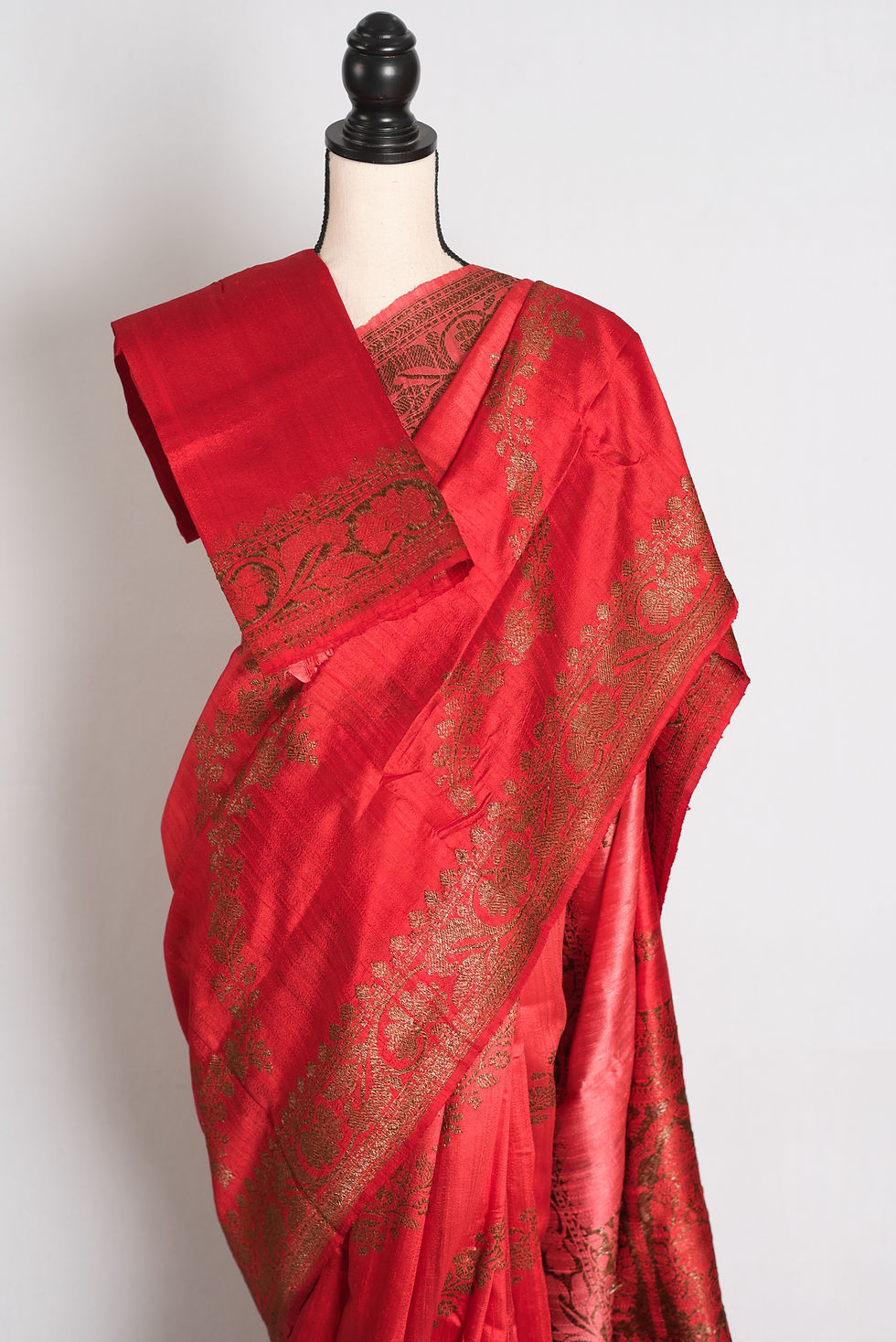 Thumbnail: Red and gold ombre raw silk handloom Banarasi saree featuring antique golden zari diagonal floral vines.