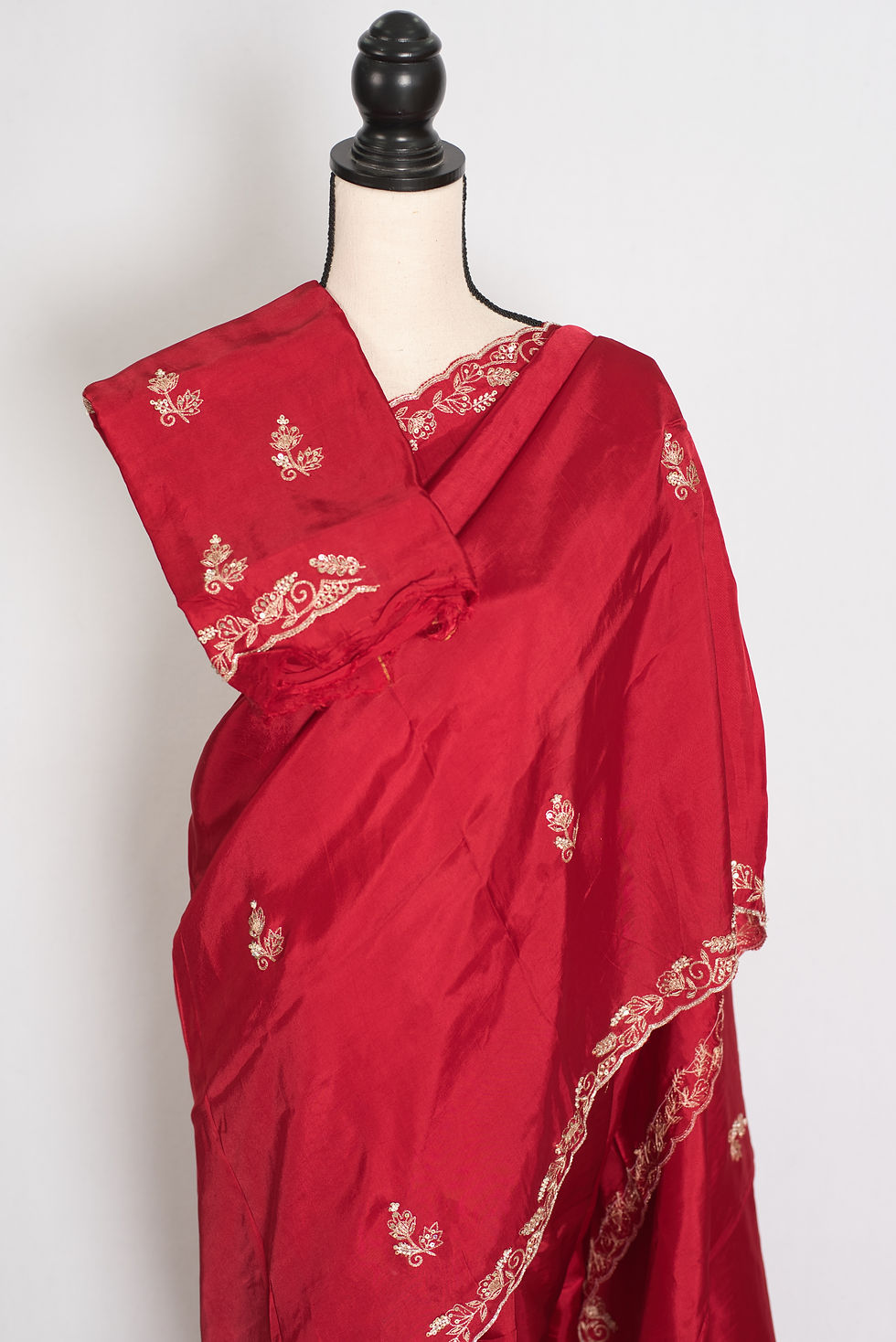 Thumbnail: Afrin radiant red semi satin partywear saree with gold Zardosi hand-embroidery and a fluid, designer drape.