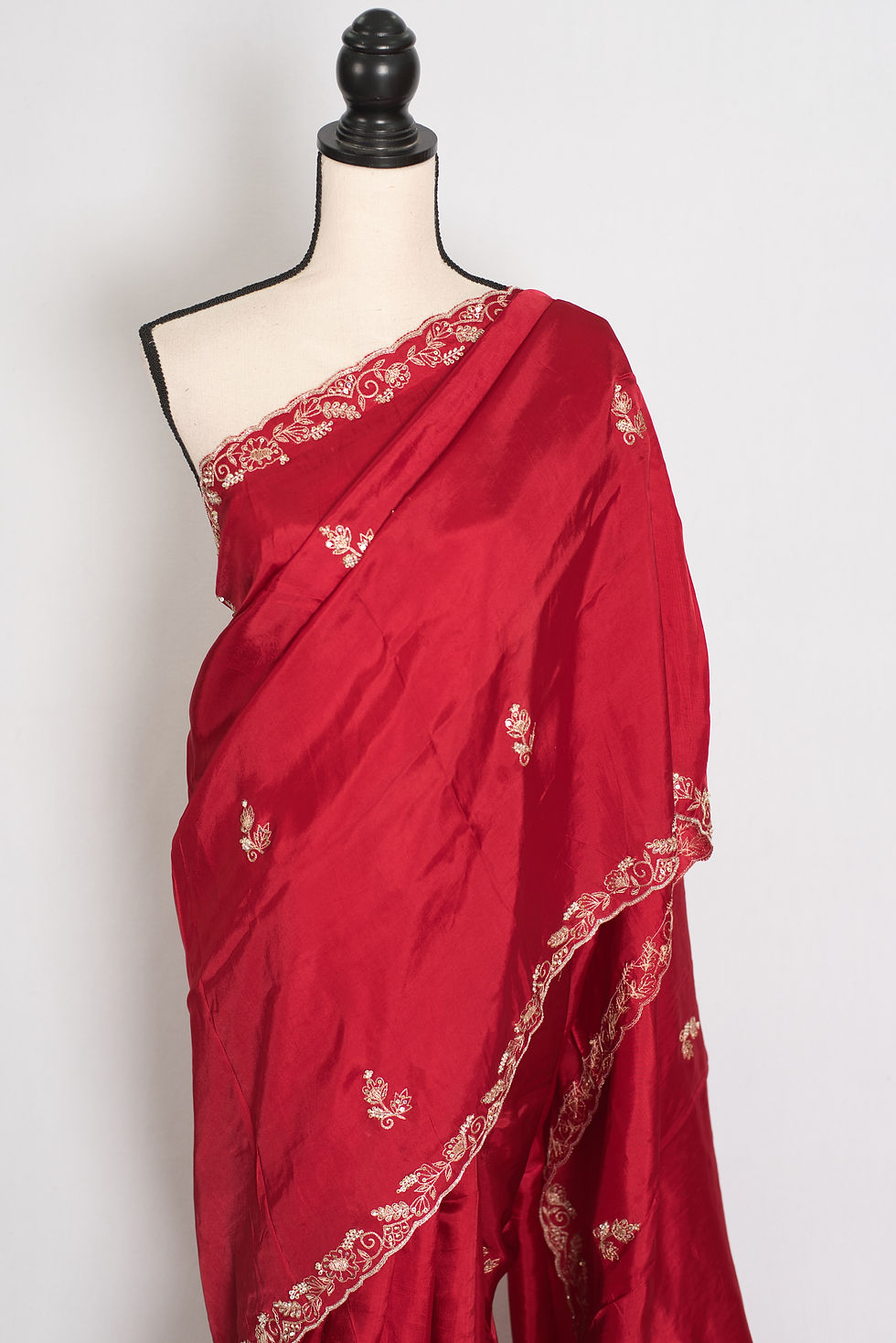 Thumbnail: Afrin radiant red semi satin partywear saree with gold Zardosi hand-embroidery and a fluid, designer drape.