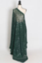 Dark green soft net sequin cocktail saree beautifully draped on a mannequin, showcasing geometric sequin motifs.