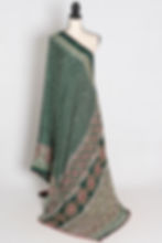Full length front view of the Heena green striped semi modal silk Ajrakh saree with hand-pasted mirror embroidery.
