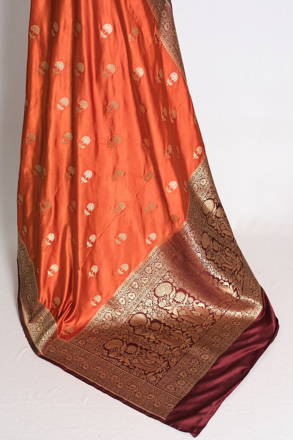 Thumbnail: Rust Orange and Brown Semi Mashru Silk Banarasi Saree draped elegantly on a mannequin.