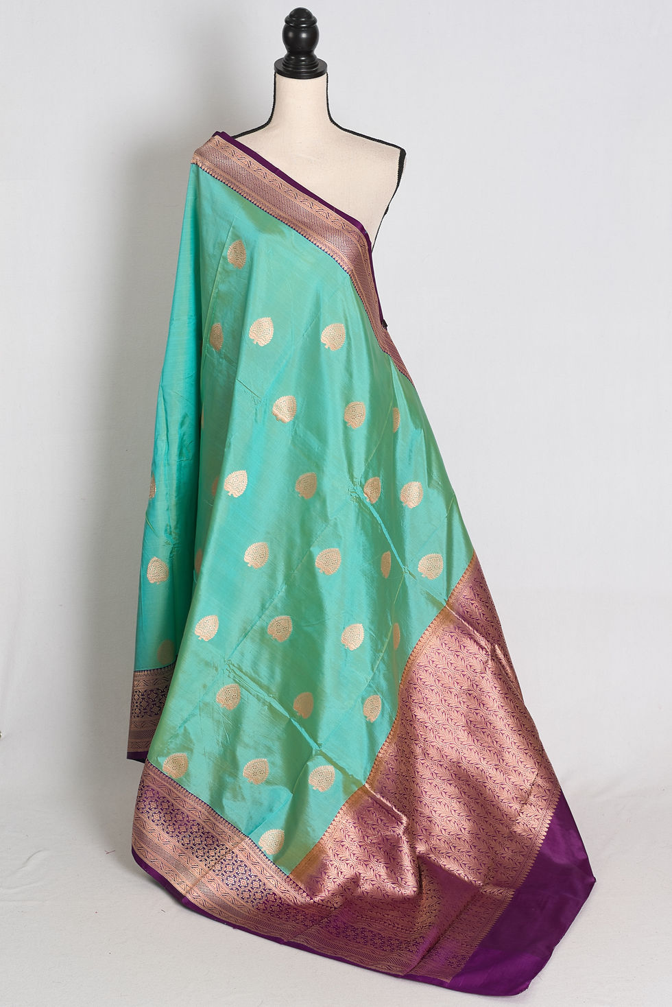 Sea green and purple pure Banarasi Katan silk saree front drape view.