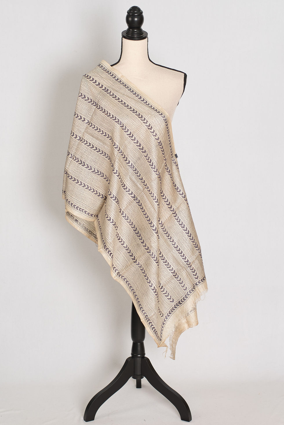Thumbnail: A Silk Mark Certified pure Tussar silk stole in natural beige draped across a mannequin.