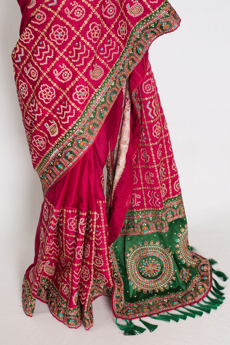 Thumbnail: Front full-length view of the purple and green traditional Gujarati style Gharchola saree draped on a mannequin.
