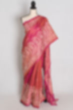 Coral pink pure Bangalore silk saree featuring hand-embroidered white Kantha stitch paisley borders draped on a mannequin.