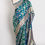 Thumbnail: Peacock green bridal Banarasi silk saree with an all-over gold zari floral jaal (Irani).