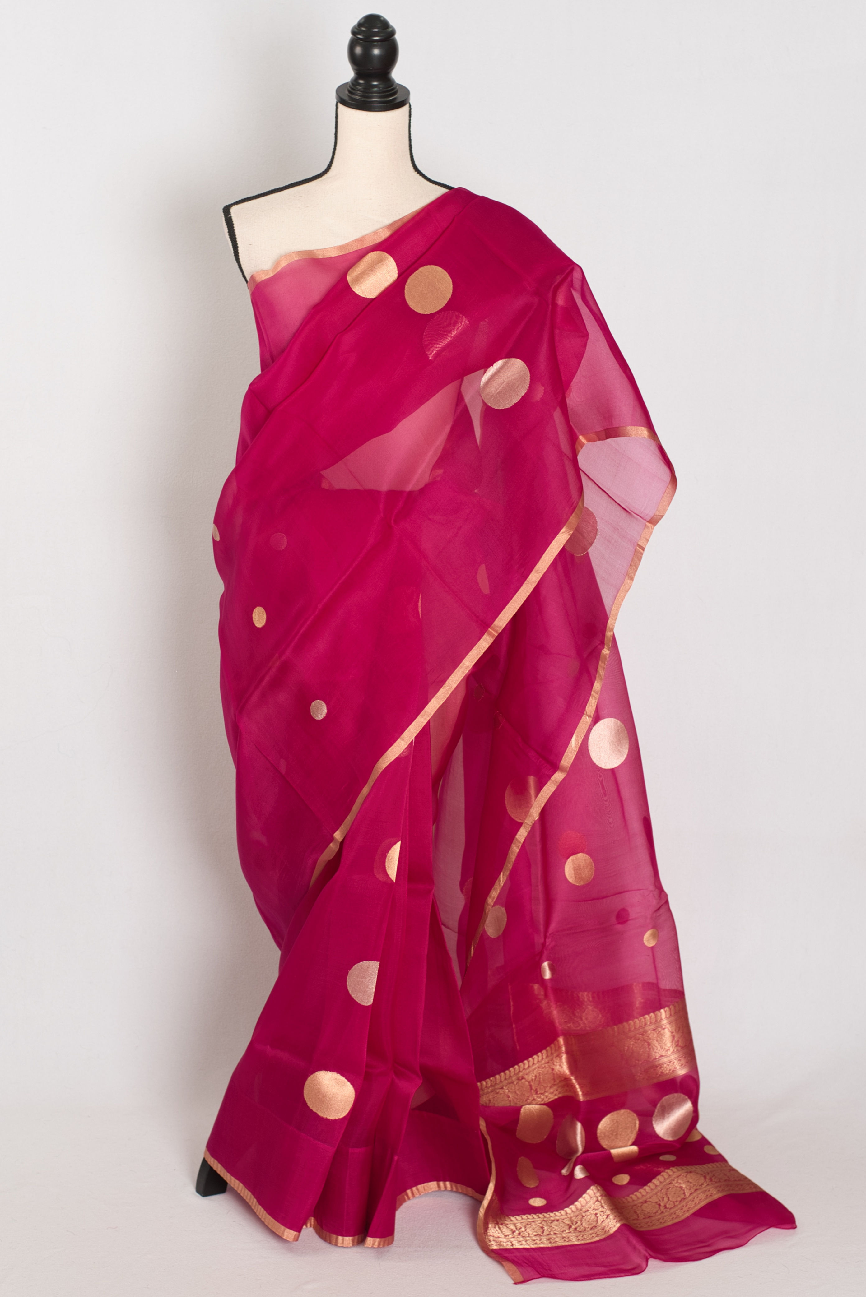 Silk Mark certified hot pink Kora organza Banarasi saree featuring contemporary gold zari polka dot motifs.