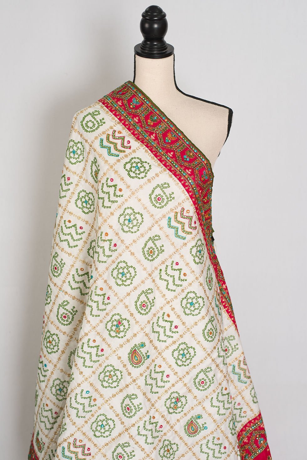 Thumbnail: Full-length front view of the off-white and pink Gujarati style Gharchola saree draped on a mannequin.