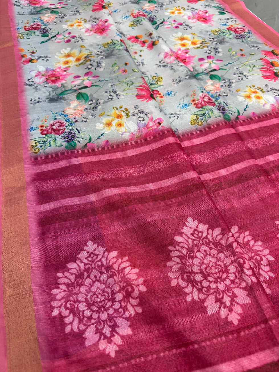 Gracy collection: Grey and pink floral printed semi tussar saree, lightweight fabric, budget-friendly ethnic wear.