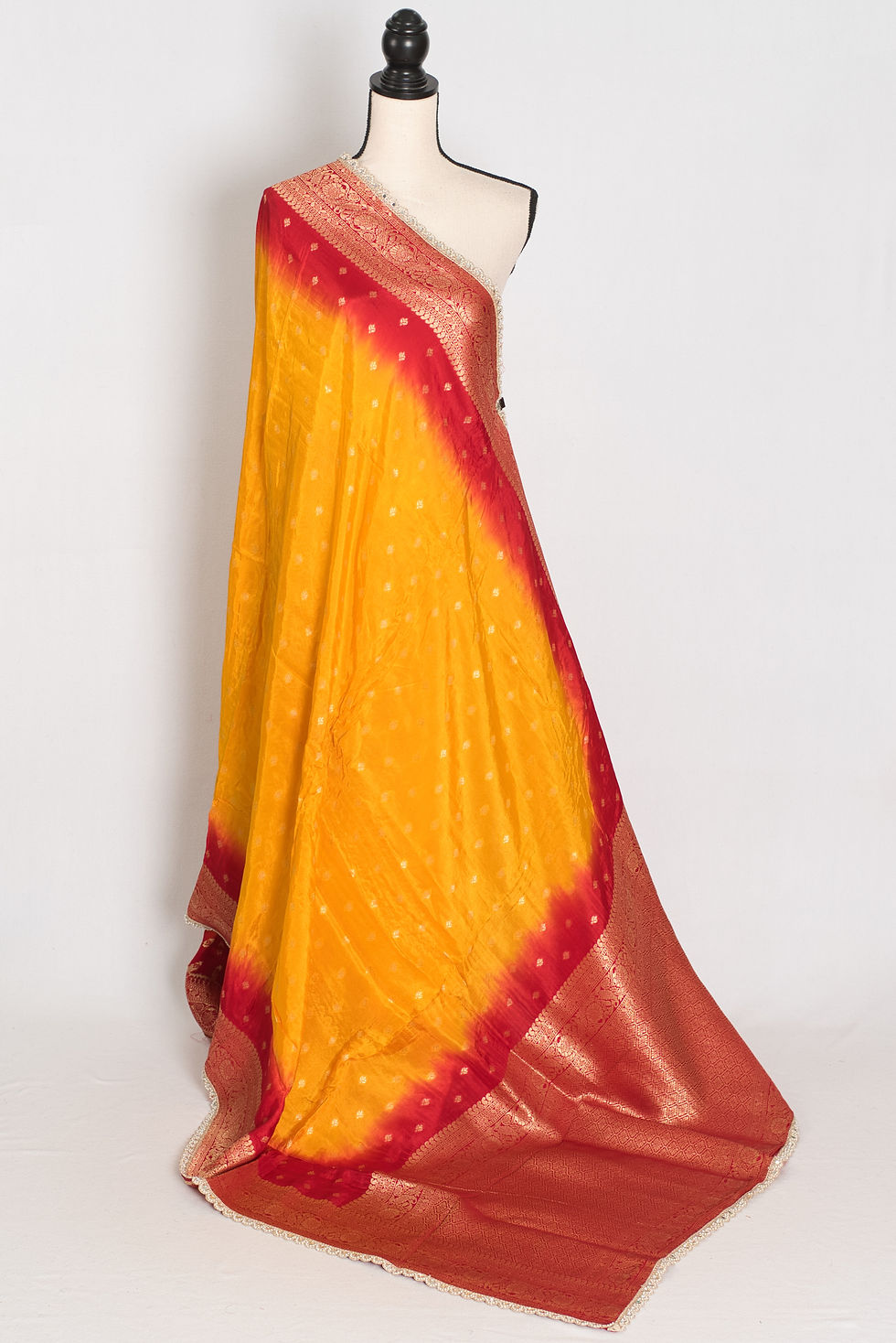 Thumbnail: Front full-length view of the yellow and red Dola silk Banarasi saree draped on a mannequin.