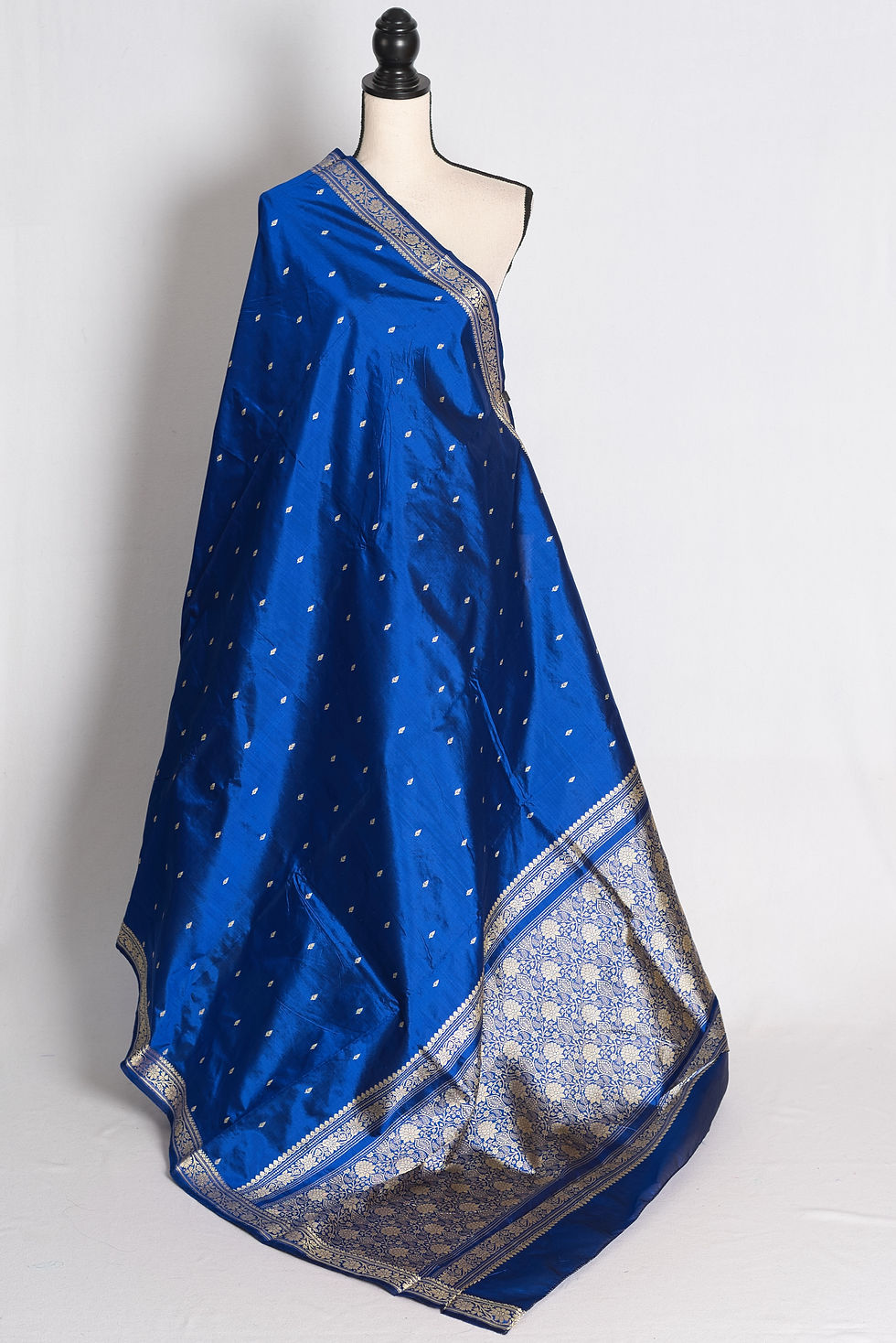 Dark Blue Pure Katan Banarasi Silk Saree draped elegantly on a mannequin showcasing its resham woven border and pallu.
