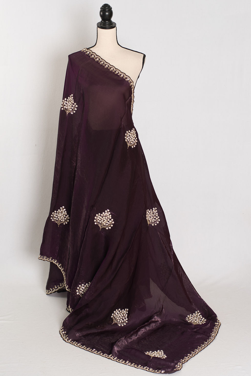 Rini deep purple glass tissue partywear saree featuring intricate hand-embroidered cut dana work.