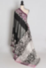 Black and gray semi silk saree featuring hand-embroidered white Kantha stitch draped on a mannequin.