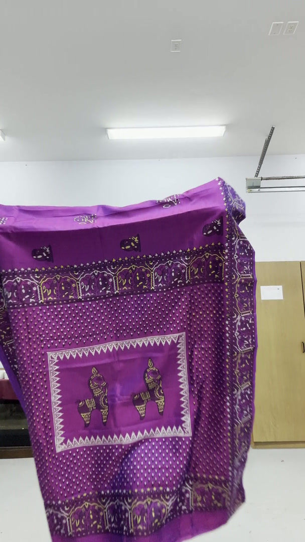 Video of the the purple and magenta pure Bishnupur katan silk saree draped on a mannequin.
