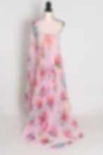 full length front view of Lia soft pink chiffon saree displaying the vibrant floral print draped on a mannequin