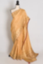 Full length front view of the beige and gold Dola silk Banarasi saree draped on a mannequin.