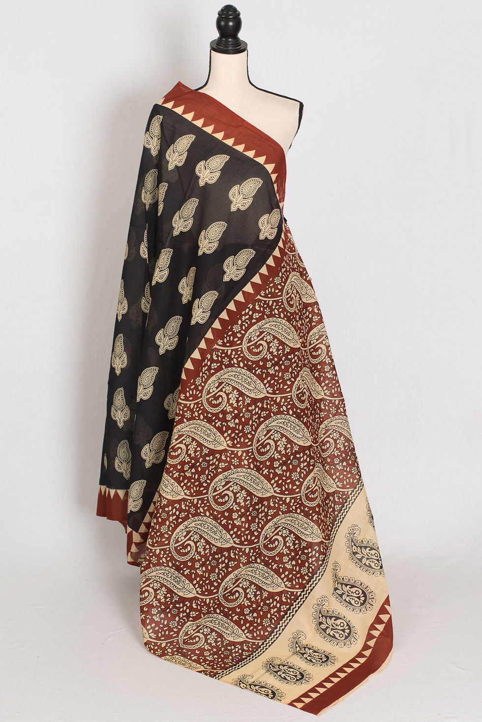 Kajal black mulmul cotton saree with traditional ivory and earthy Kalamkari floral prints and a soft, contemporary finish.