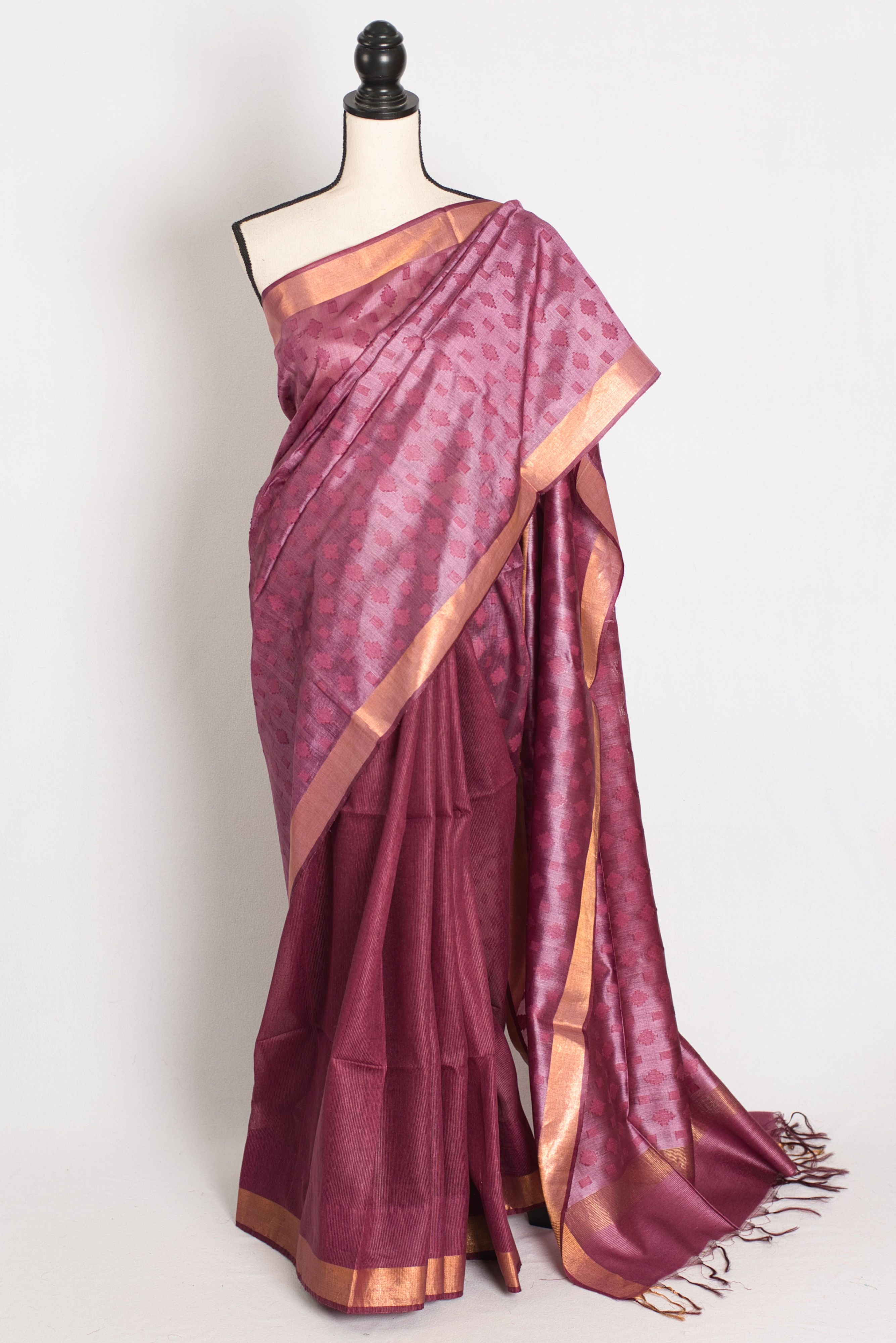 Front view of a deep purple half-and-half saree featuring Tussar and Matka silk on a mannequin.