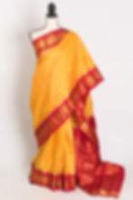 Vibha Haldi yellow and red checks handwoven Gadwal silk saree with golden zari border.