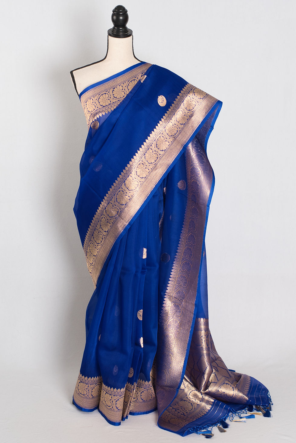 royal blue and gold kora organza banarasi saree featuring hand woven chand sitara motifs on a mannequin drape.
