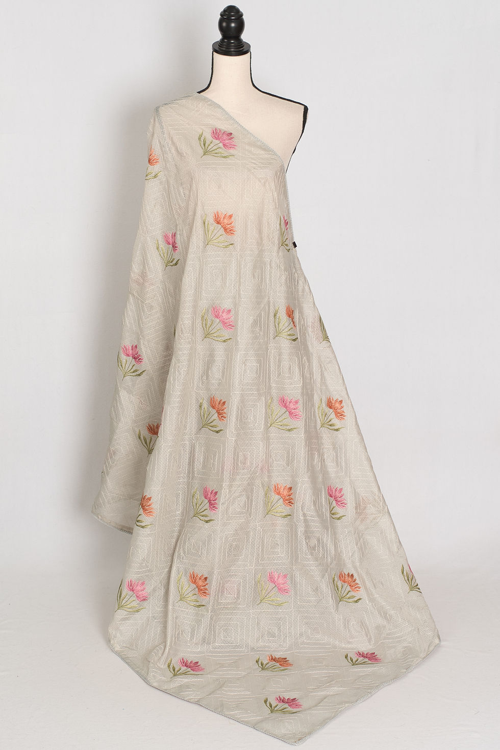Thumbnail: Grey soft semi kota silk saree with pink and orange floral machine embroidery.