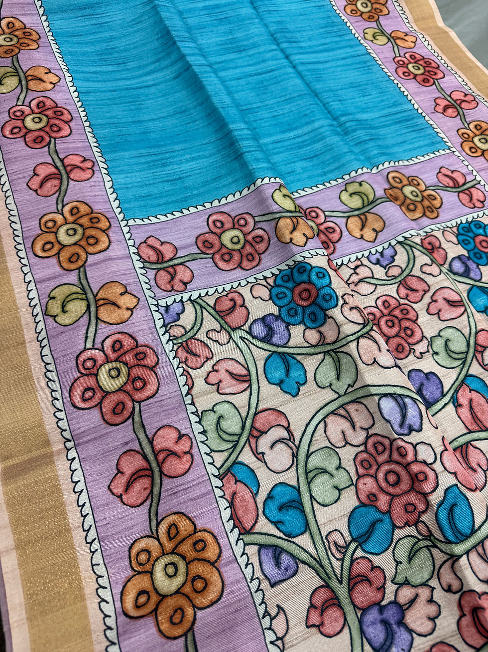 Nila collection Blue and Peach Semi Tussar Saree with floral Kalamkari print and gold border.