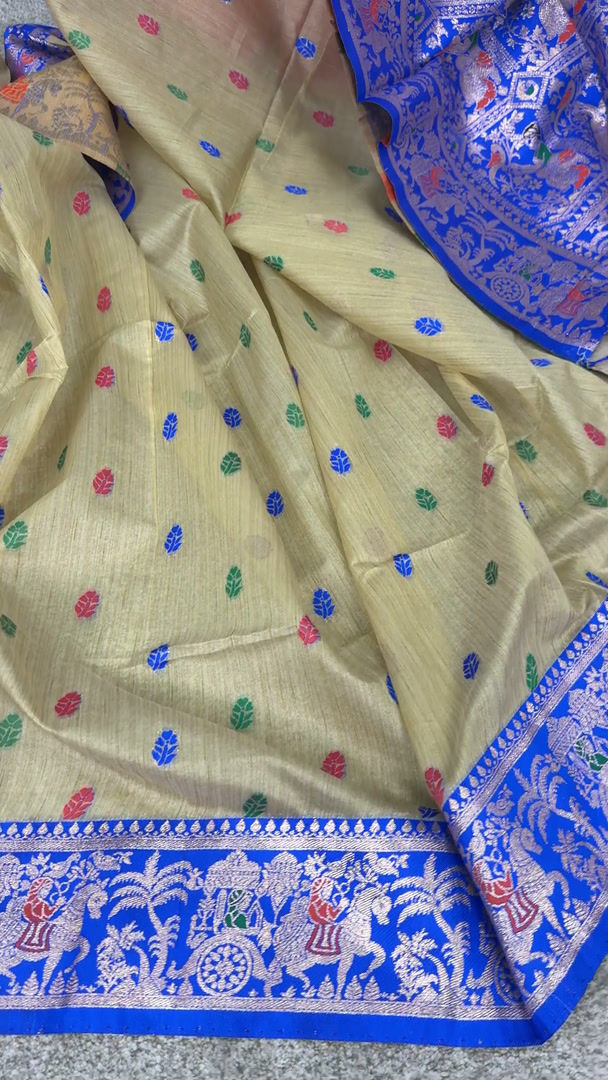 Video of a beige blended cotton Baluchari saree with a royal blue contrast border .