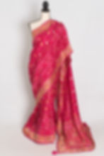 Front full-length view of the dark pink hand embroidery soft Dola silk Banarasi saree draped on a mannequin.