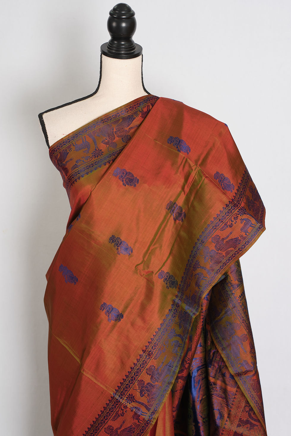 Thumbnail: Front full-length view of the orange and green shot silk handwoven Baluchari saree draped on a mannequin.