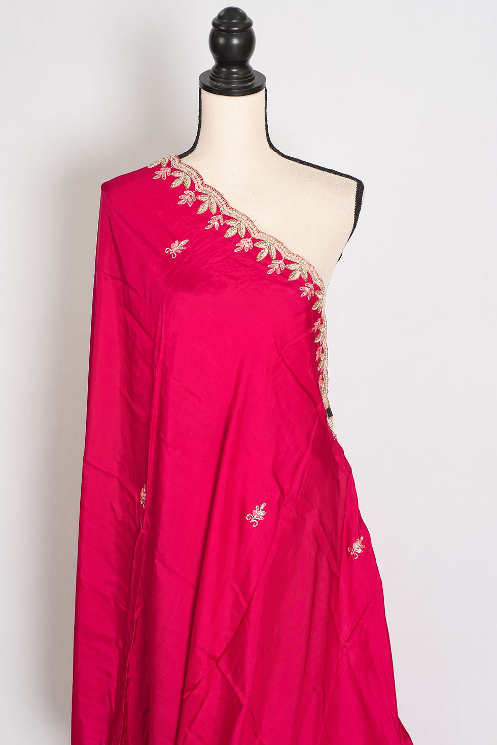 Thumbnail: Sunaina dark pink partywear saree with gold Zardosi embroidery, sparkling stone work, and a lightweight designer drape.