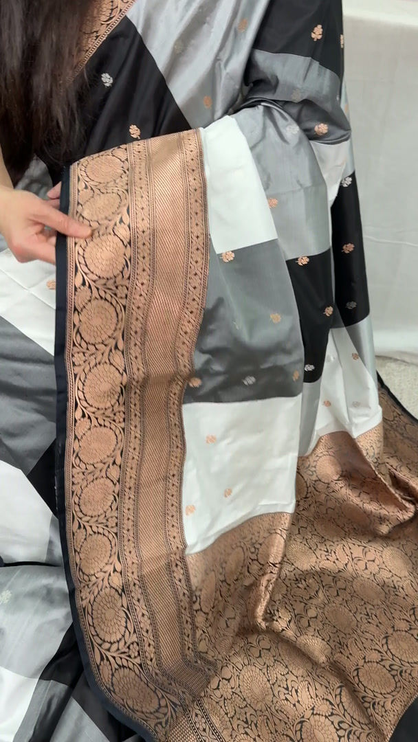 Video of Mala Katan Banarasi silk saree featuring black and grey checkered pattern with antique copper zari.