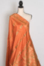 Thumbnail: Front full-length view of the vibrant orange and green handwoven Bishnupuri Swarnachari pure silk saree draped on a mannequin