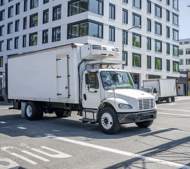 small-compact-rig-semi-truck-refrigerator-box-trailer-transporting-goods-street-urban-city