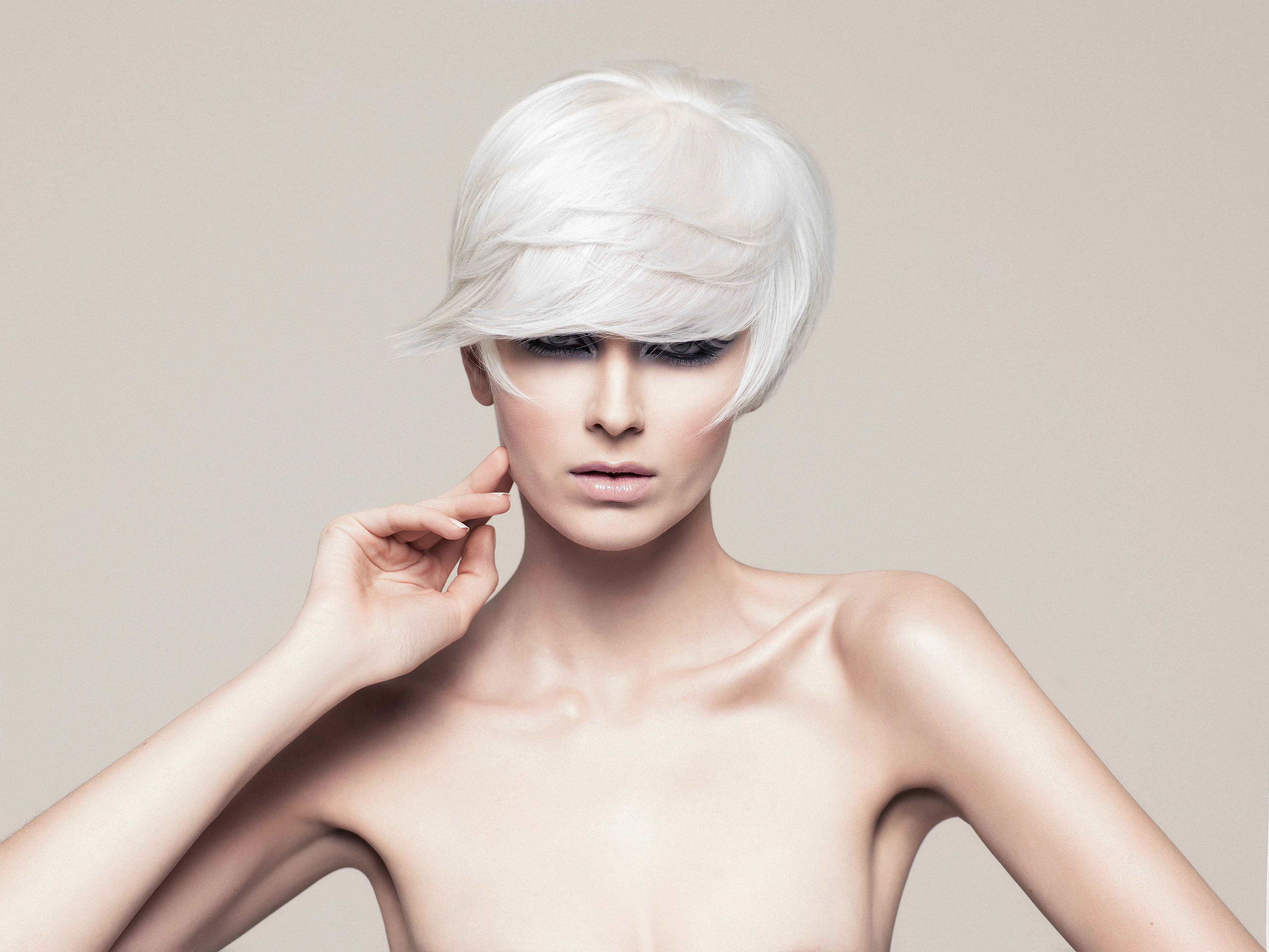 Minimal high-fashion beauty portrait with pale short hair and soft neutral backdrop, Beauty of Class by Tommy Napolitano