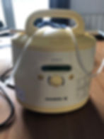 tire-lait Medela jaune