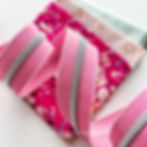 Candy Stripe #5 Zipper Tape with Silver Nylon Coil shown with coordinating fabric