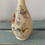 Thumbnail: Pair of Victorian cream opaline milk glass hand painted bud vases