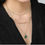 Thumbnail: Multi Layered Gold and Pearl Green Stone Drop Necklace