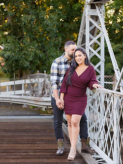 Couple on bridge, autumn engagement photo