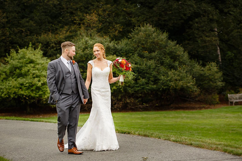Bride and Groom Walking in the park