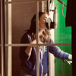 Sara Bareilles singing in the iso booth 2021