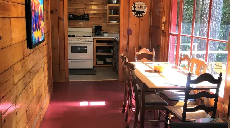 View from living room to dining area & kitchen of Bear Cave.