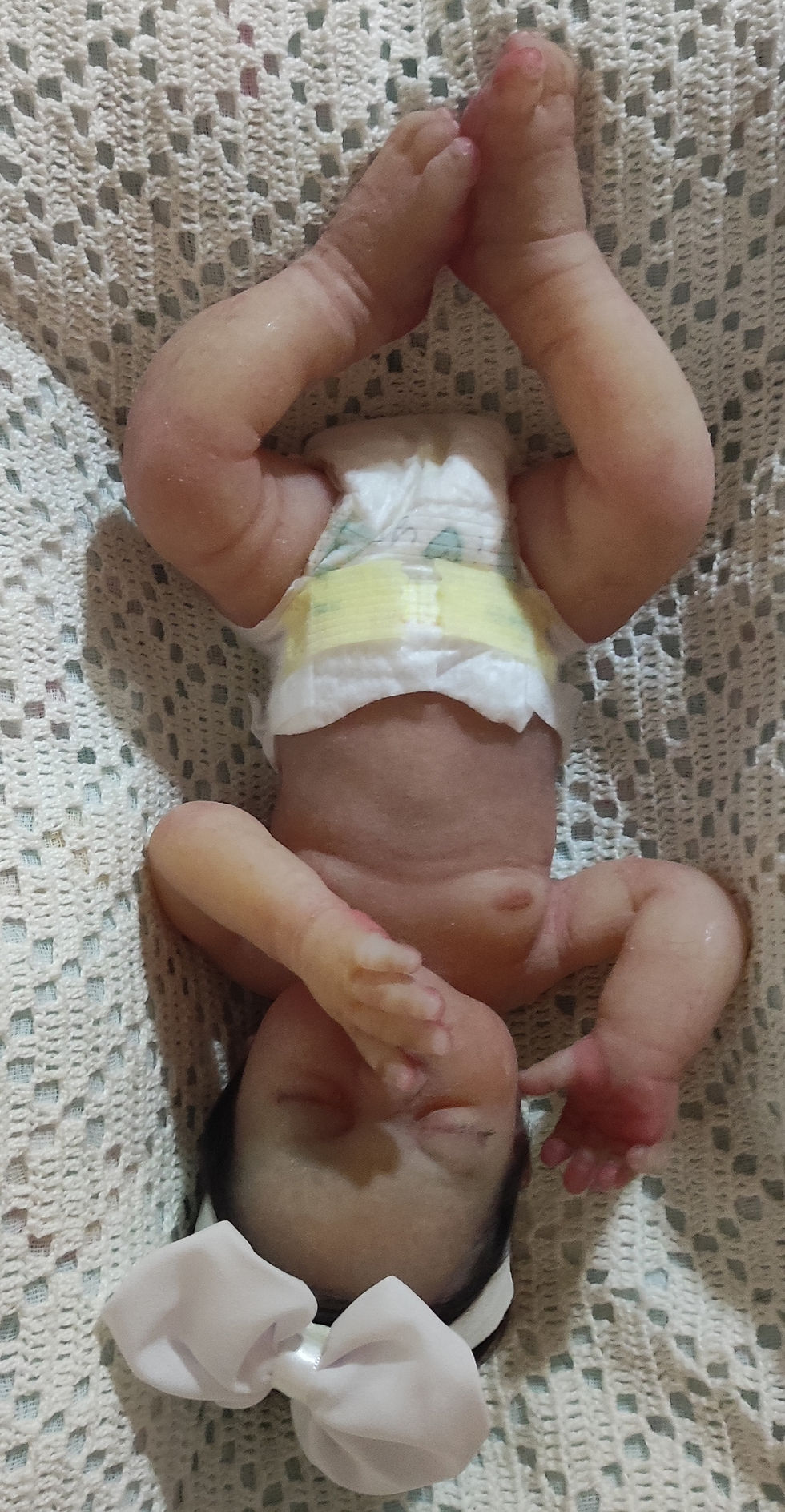 Bebê de silicone sólido com armação, mama e faz xixi