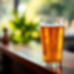inviting, bright but blurred image associated with a full glass of beer.jpg
