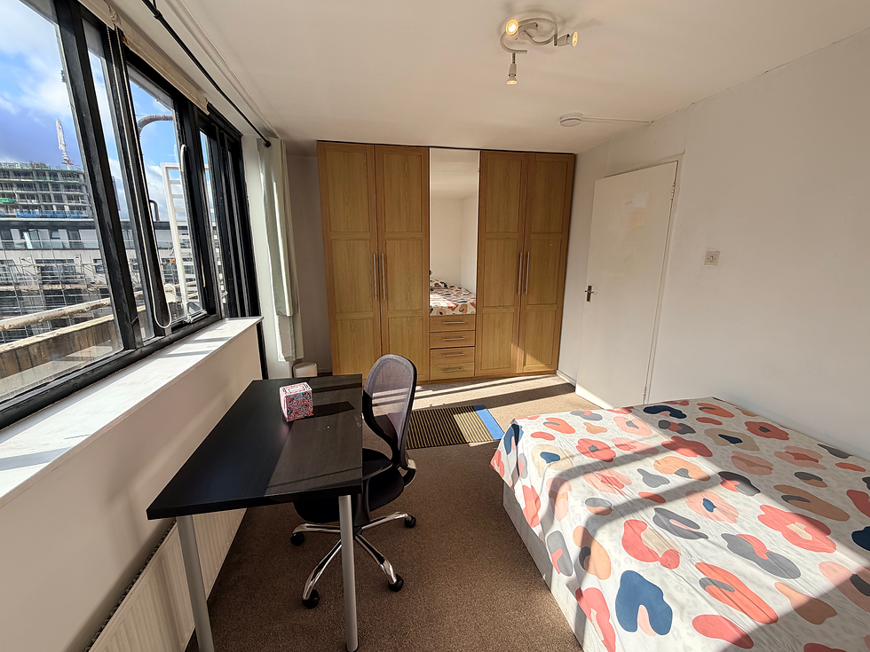Furnished bedroom with private balcony