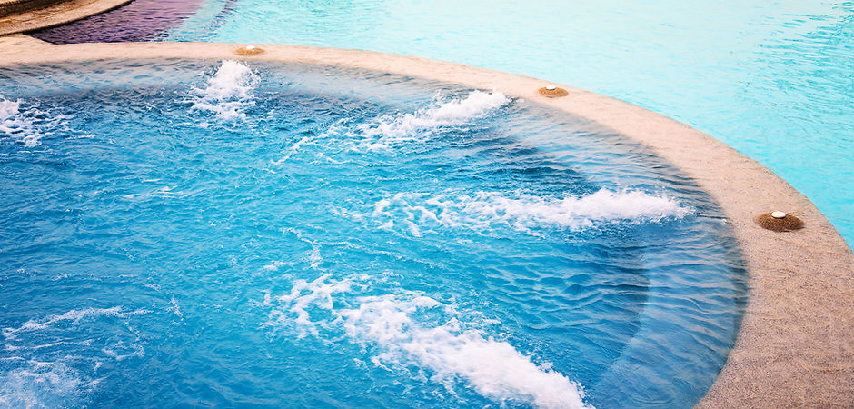 Outdoor Jacuzzi Pool with Fresh Blue Water for Massage and Spa.jpg