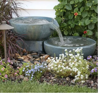 water features, water fountain, decorative pebbles, landscaping.