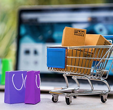 Shopping online concept - Parcel or Paper cartons with a sho.jpg